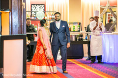 Sweet indian couple arriving at wedding reception indian wedding reception,indian wedding reception photography,indian bride and groom