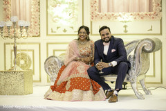 Adorable indian couple laughing indian wedding reception,indian wedding reception photography,indian bride and groom