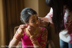 Indian bride's final touch ups. indian bride,getting ready,hair and makeup