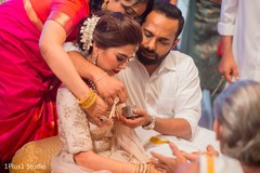 Indian bride and groom's Sindhoor wedding ritual Indian bride and groom's Sindhoor wedding ritual