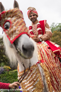 Indian groom riding the baraat horse. Indian groom riding the baraat horse.