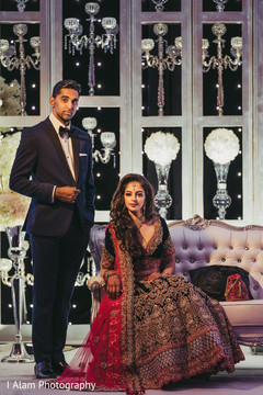 Glamorous indian bride and groom wedding reception outfit