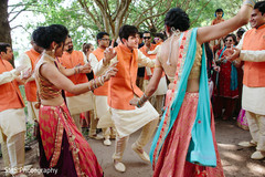 Indian groomsmen dancing during baraat Indian groomsmen dancing during baraat