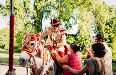 Indian groom riding the traditional white horse. Indian groom riding the traditional white horse.