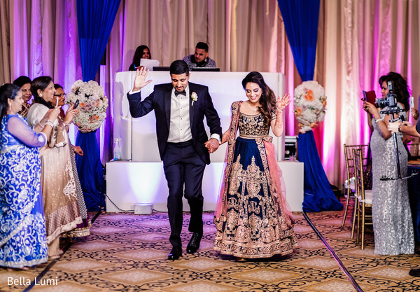 Bubbly Indian newlyweds entrance.
