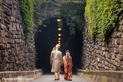 Sweet indian couple walking holding hands Sweet indian couple walking holding hands