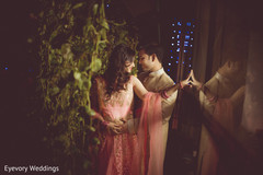 Indian bride and groom intimate moment Indian bride and groom intimate moment