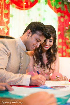 Indian bride and groom during engagement celebration Indian bride and groom during engagement celebration