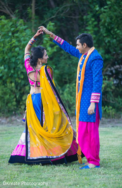 Glamorous indian bride spinning around groom Glamorous indian bride spinning around groom