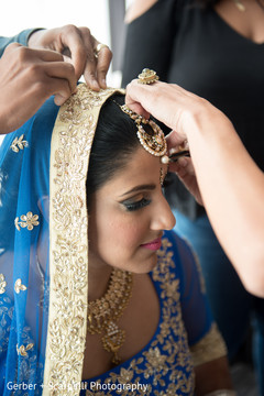 Final touch ups for Indian bride wedding attire. Final touch ups for Indian bride wedding attire.
