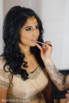 Lovely bride getting her makeup done Lovely bride getting her makeup done
