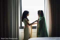 Final touch ups for indian bride wedding attire Final touch ups for indian bride wedding attire