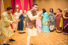 Indian groom's sangeet performance Indian groom's sangeet performance