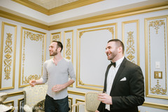 Indian groom getting ready candid scene.