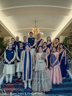 Indian couple with their glamorous bridal party Indian couple with their glamorous bridal party