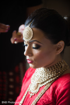 Lovely bride getting her makeup done Lovely bride getting her makeup done