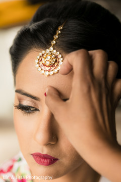 Traditional bridal bindi. Traditional bridal bindi.