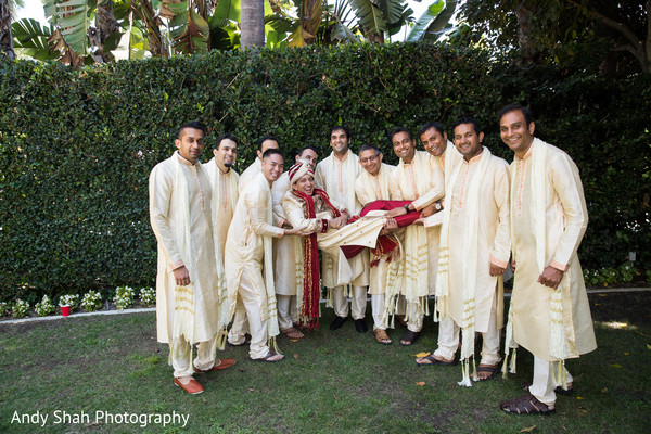 Indian groom posing with groomsmen