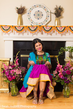 Indian bride showing mehndi art Indian bride showing mehndi art