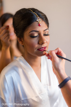 Lovely Indian bride being dolled up. Lovely Indian bride being dolled up.