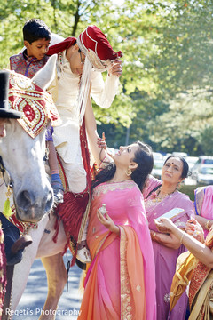 Indian groom riding the traditional white horse. Indian groom riding the traditional white horse.