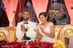 Indian bride and groom at their wedding celebration. Indian bride and groom at their wedding celebration.