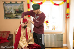 Indian groom turban wrapping. Indian groom turban wrapping.