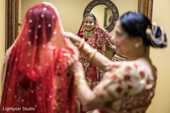 Indian bride outfit final touch ups. Indian bride outfit final touch ups.