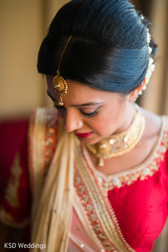 Indian bride glowing in her wedding attire. Indian bride glowing in her wedding attire.