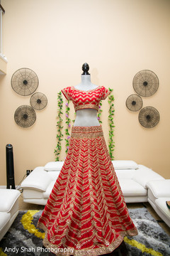 Stunning red and gold bridal ceremony lehenga. Stunning red and gold bridal ceremony lehenga.