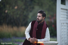 Elegant indian groom posing for photo shoot Elegant indian groom posing for photo shoot