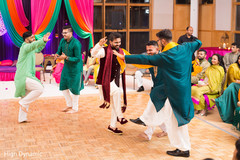 Indian groom's sangeet performance Indian groom's sangeet performance