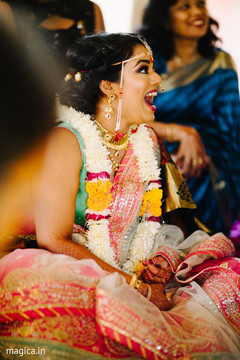 Indian bride enjoying pre-wedding ritual Indian bride enjoying pre-wedding ritual