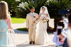 Insanely cute Indian bride entry.