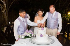 Indian wedding family cake cutting. Indian wedding family cake cutting.
