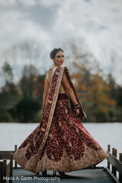 Indian bride glowing in her wedding attire. Indian bride glowing in her wedding attire.