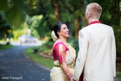 Joyful indian bride looking at the groom Joyful indian bride looking at the groom