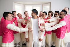 Charming indian groom getting ready scene Charming indian groom getting ready scene