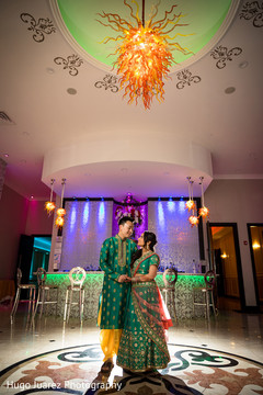 Indian bride and groom in matching outfits. Indian bride and groom in matching outfits.