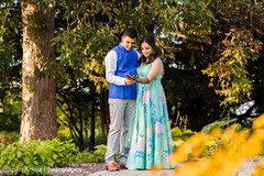 Indian groom admiring bride's mehndi art Indian groom admiring bride's mehndi art