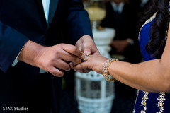 Enchanting Indian couple ring exchange. Enchanting Indian couple ring exchange.