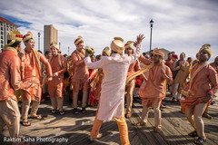 Indian groom with groomsmen during baraat Indian groom with groomsmen during baraat