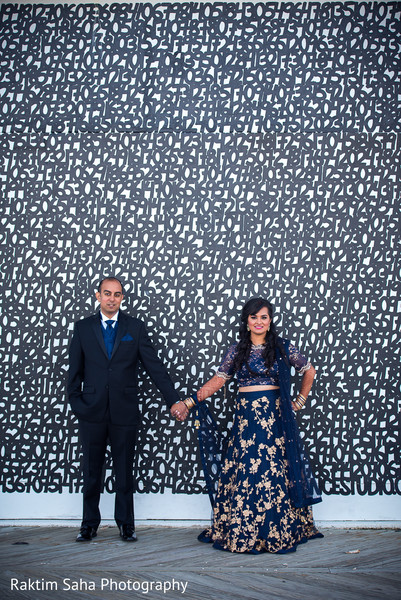 Elegant indian bride and groom's wedding reception fashion