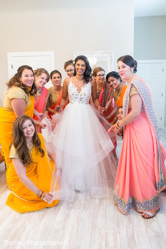 Indian bride getting ready with bridesmaids capture Indian bride getting ready with bridesmaids capture
