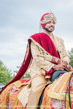 Indian groom riding baraat horse Indian groom riding baraat horse