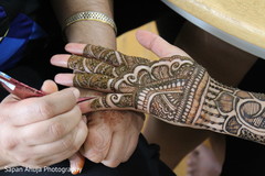 Mehndi artist at work Mehndi artist at work