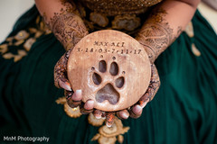 Indian bride holding personalized pet memorial stone Indian bride holding personalized pet memorial stone