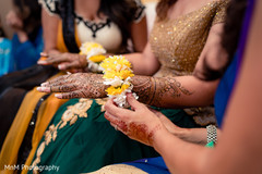 Indian bride during mehndi party Indian bride during mehndi party