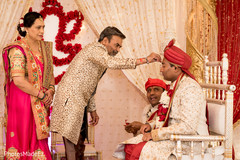 Indian groom during wedding ceremony Indian groom during wedding ceremony