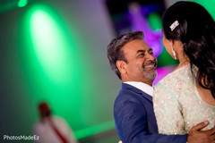 Lovely indian bride dancing with her father Lovely indian bride dancing with her father